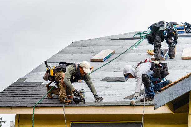 Professional Gutter Installation technician working in Colbert, OK